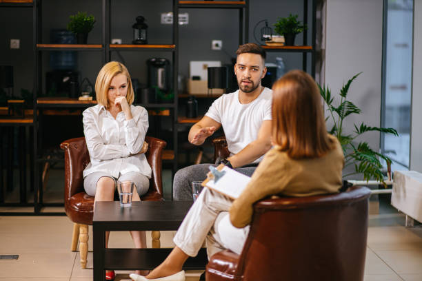istock unhappy married couple sit having conversation with psychologist 1227214241