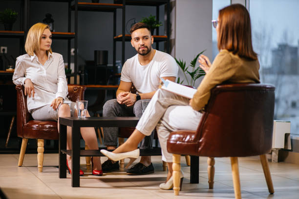 istock unhappy married couple sit having conversation with psychologist 1227214404