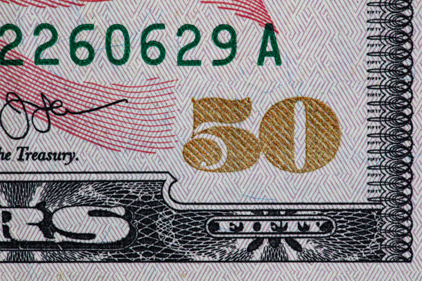 istock fragment of 50 dollar bill 1227218560