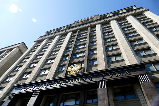 Moscow, Russia - April 24. 2019: Huge building of the State Duma commonly abbreviated in Russian as Gosduma. It is the lower house of the Federal Assembly of Russia.