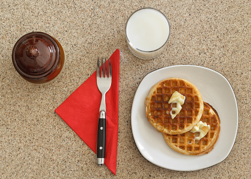Ready to eat waffles and milk. Flat lay view.