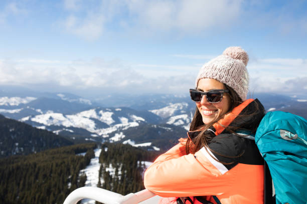 istock A beautiful young woman on an observation deck 1227224579