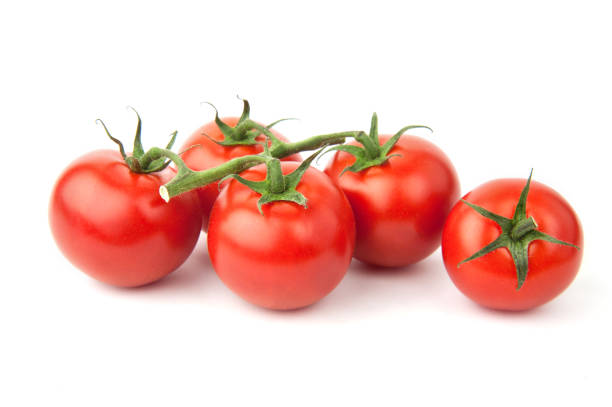 istock Ripe cherry tomatoes isolated on white background. Fresh and btight vegetables 1227224752