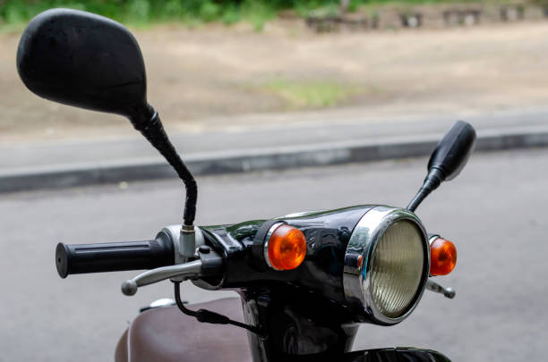 istock Round spotlight of a moped close-up. 1227224945