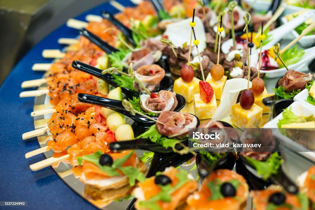Plate with canapes and snacks, close up. Buffet Stock Photo