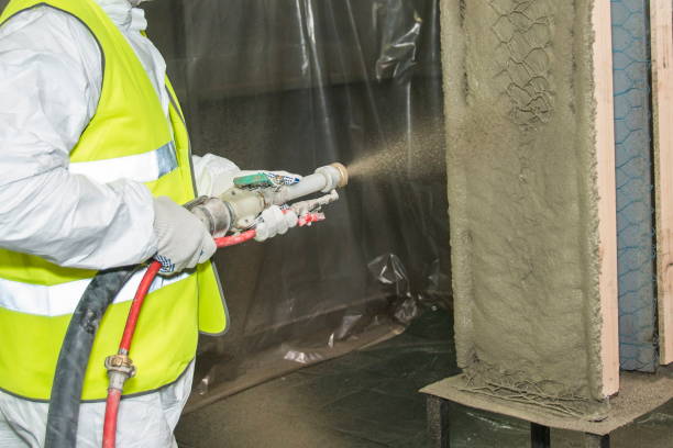 Covering a wall by fireproofe refractory composition. stock photo