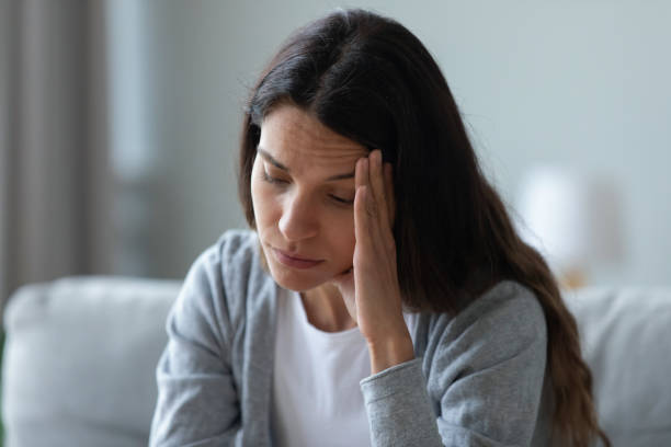 istock Unhappy thoughtful woman touching face, thinking about problems 1227225956