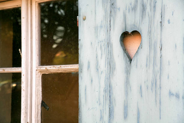 istock fretwork heart made on wooden shutter 122722693