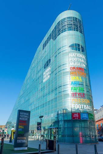 Manchester, England, UK - 11th March 2014: Wide angle view of the National Football Museum located in the Urbis building. The Urbis was designed by Ian Simpson.