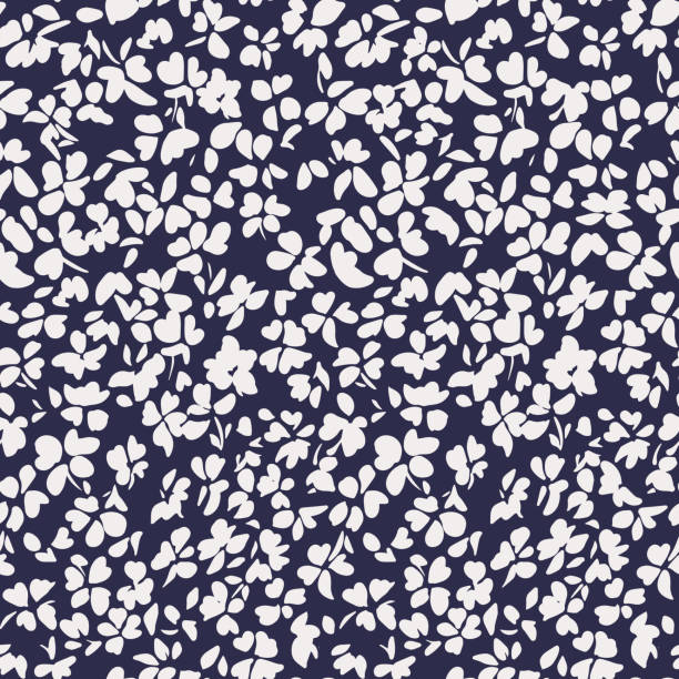 Simple botanical background. Nature ornament. Seamless pattern made of plain flower buds. Glade of small modest daisies. Trendy flat illustration. Fashion, textile and fabric application. Simple botanical background. Nature ornament. Seamless pattern made of plain flower buds. Glade of small modest daisies. Trendy flat illustration. Fashion, textile and fabric application. all over pattern stock illustrations