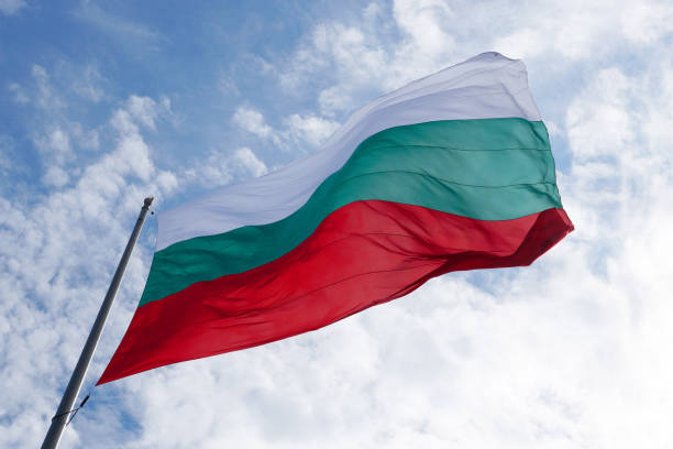 istock Bulgaria flag waving in the wind against sky 1227231827