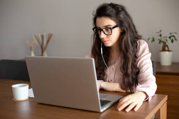 istock Woman working from home with laptop 1227236459