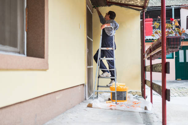 istock Senior man painting the wall 1227237642