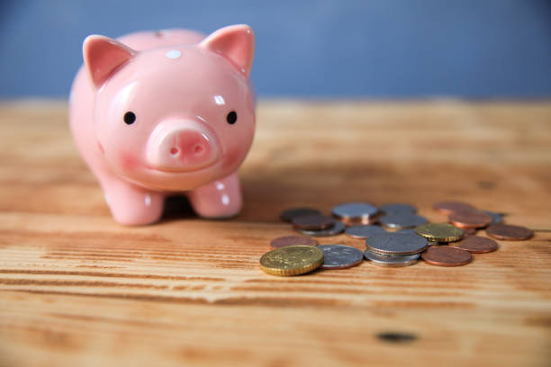 istock piggy bank with coins 1227237762