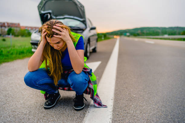istock Upset woman with damaged car 1227242857