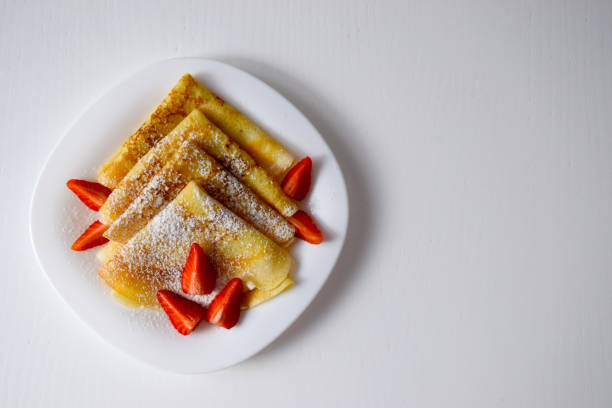 istock Homemade thin pancakes with strawberry 1227244925