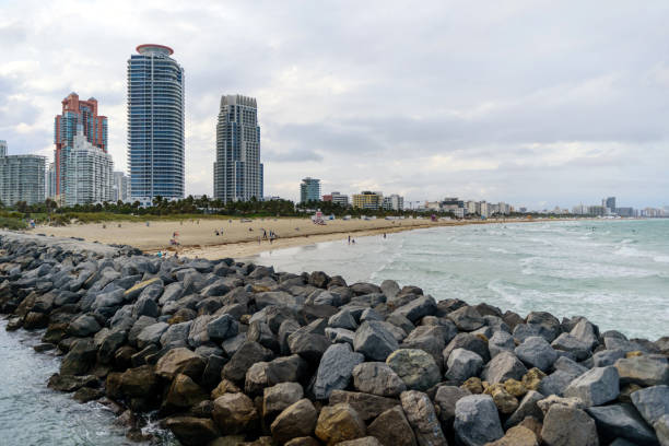 istock Beach with city in the background 1227245081
