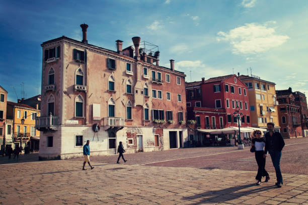 Venice, Metropolitan City of Venice, Italy- Tourists walking and enjoying on the streets