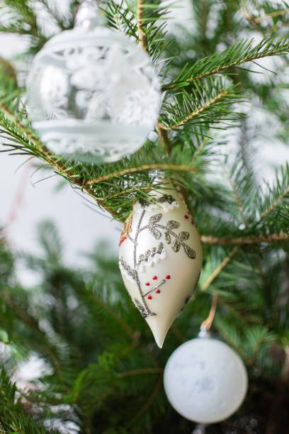 istock Green fir tree branches with christmas toys 1227246007