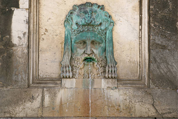 istock antique Roman fountain 122724844