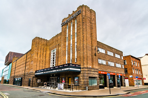Chester, England - September 12, 2019: Storyhouse, a cultural building that includes a theatre, cinema, restaurant and the city library. It is housed in the remodelled 1936 Odeon Cinema.
