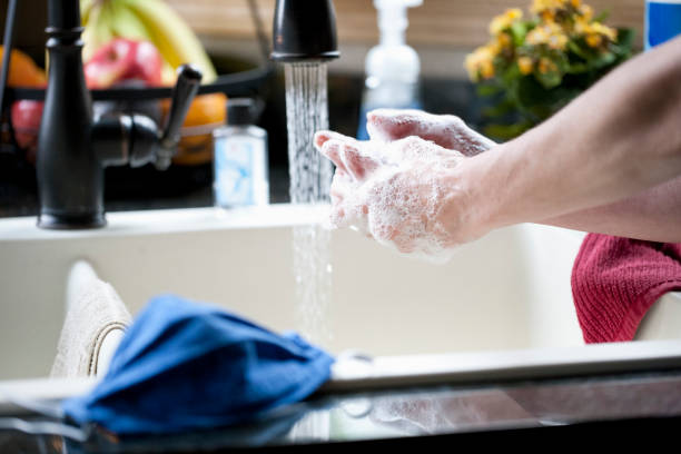 istock Woman Washing Hands 1227258689