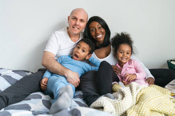 istock A family cuddle together in bed 1227261197
