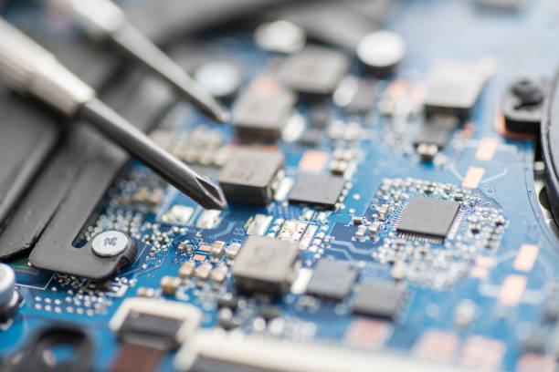 istock Professional repair of computers, laptops, boards. Screwdrivers, macro, close-up 1227261384