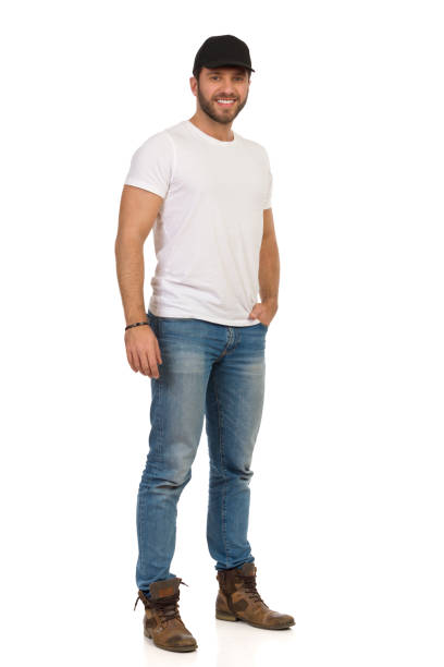 istock Standing Man Black Cap Is Posing With Hand In Pocket 1227261496