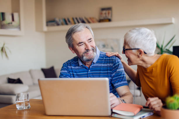 istock Senior couple working from home office 1227263281