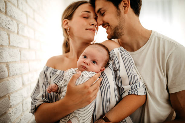 istock Happy family with baby 1227264396