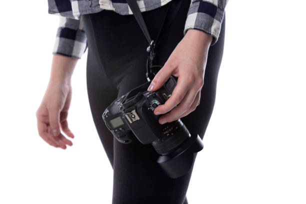 istock Close Up Camera Held by a Self-Employed Gig Photographer 1227266839