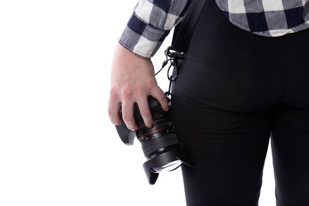 istock Close Up Camera Held by a Self-Employed Gig Photographer 1227266842