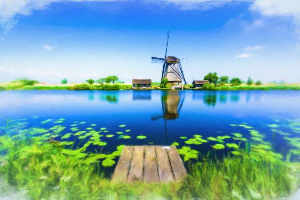 istock Traditional dutch windmills and houses 1227270186