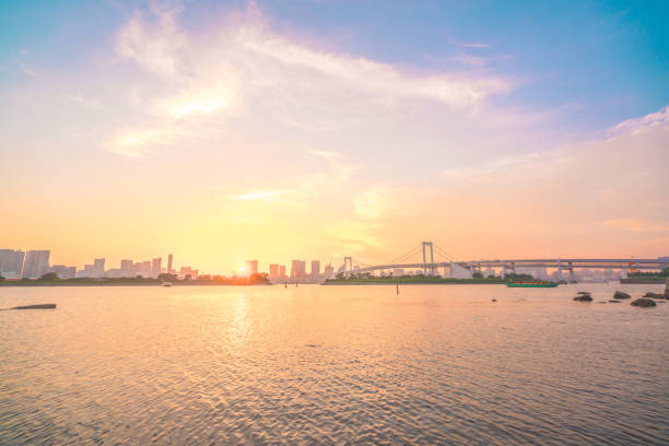 Tokyo downtown skyline and Rainbow Bridge at