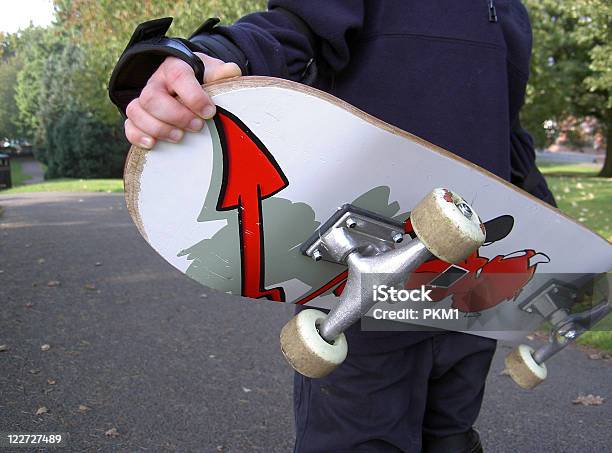 Boy Holding Skateboard Stock Photo - Download Image Now - Activity, Boys, Child