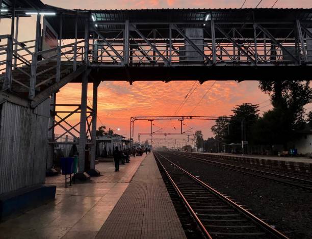 istock Indian Railway Station Platform against Dramatic Sunset 1227278047