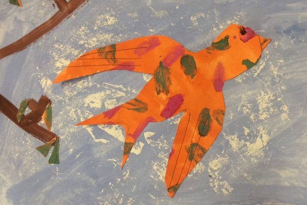 istock bird on a blue background. children's drawing. occupation at home. productive activities . 
mixed media 1227279845
