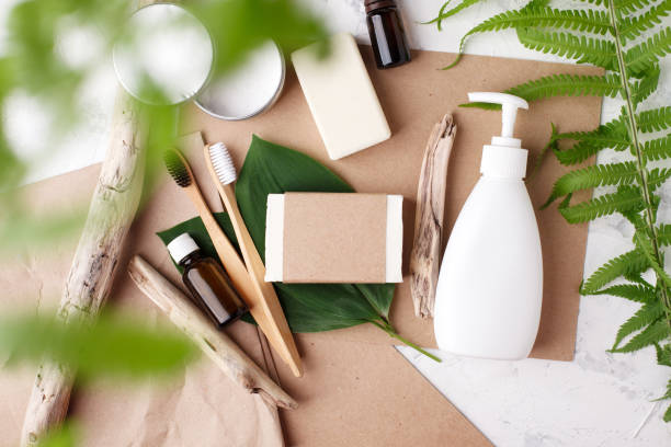 istock Zero waste bathroom accessories, natural bamboo toothbrush, coconut solid soap and shampoo bars, reusable metal jar with toothpaste, concept of eco-friendly sustainable lifestyle, bathroom 1227279849