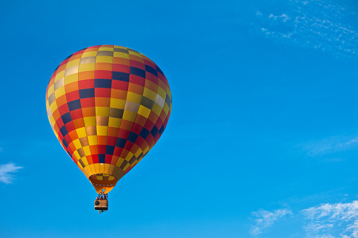 Colorful hot air balloon in a blue sky