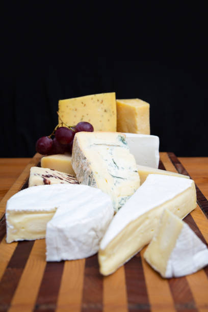 istock Heap of soft, blue and spicy cheeses 1227285779