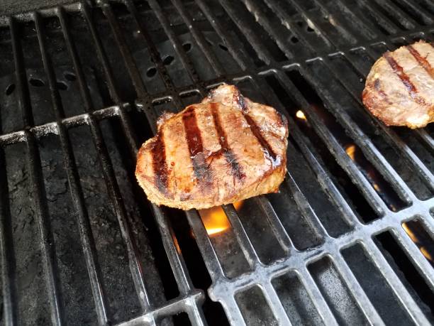 istock steak meat grilling on barbecue grill bars 1227289329
