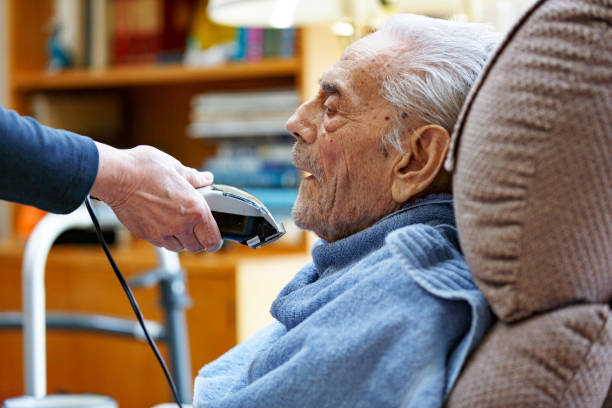 istock Coronavirus Home Haircut Beard Trim Elderly Man 1227290580