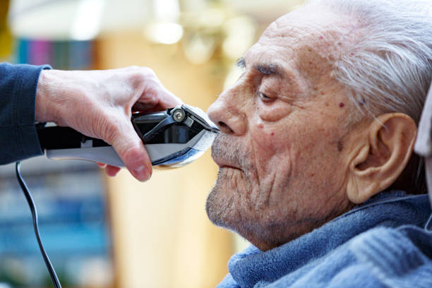 istock Elderly Man Home Haircut Beard Trim During Coronavirus Lockdown 1227290927