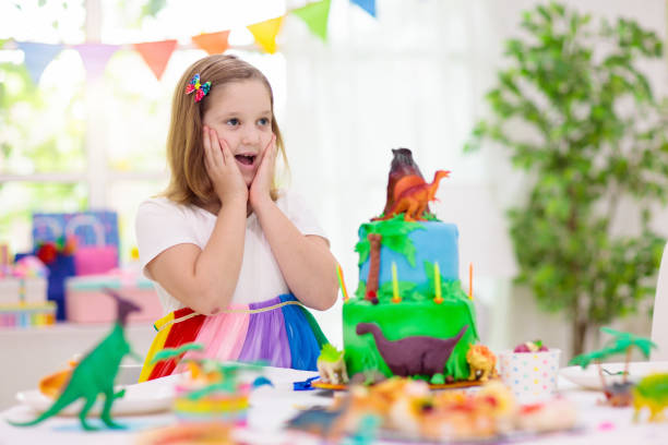 istock Kids birthday party. Dinosaur theme cake. 1227291958