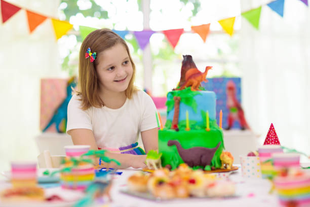 istock Kids birthday party. Dinosaur theme cake. 1227291997