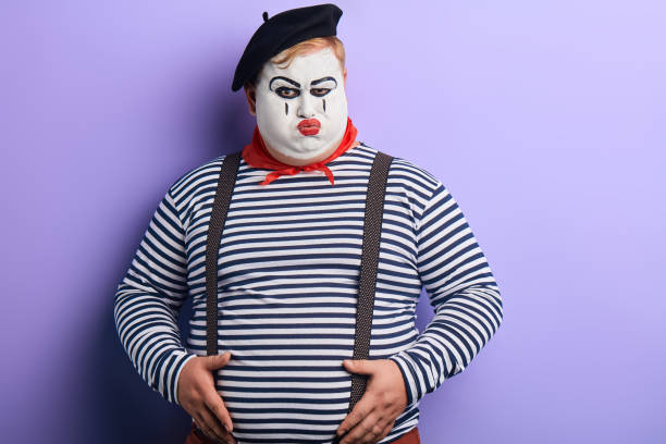 istock serious unhappy strict clown performing a sketch 1227292077