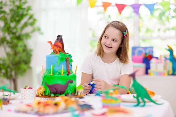 istock Kids birthday party. Dinosaur theme cake. 1227292174