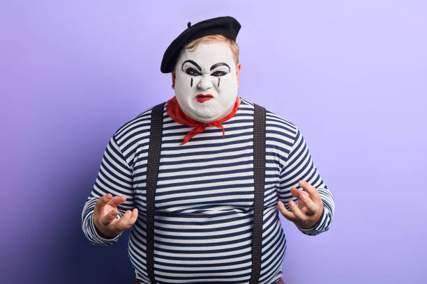 istock I'll kill you. agressive clown being hysterical 1227292196