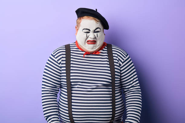 istock nervous fat artist weeping in the studio with blue wall 1227292241
